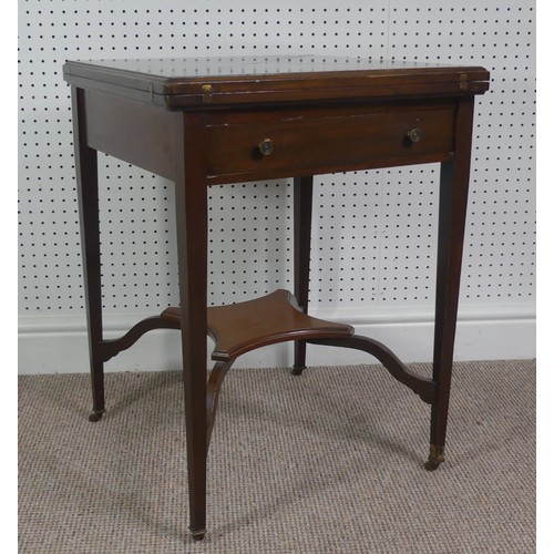 274 - An Edwardian mahogany envelope card table, having single frieze drawer, raised platform undertier, W... 