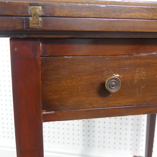 274 - An Edwardian mahogany envelope card table, having single frieze drawer, raised platform undertier, W... 