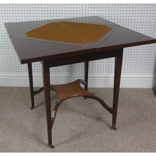 274 - An Edwardian mahogany envelope card table, having single frieze drawer, raised platform undertier, W... 