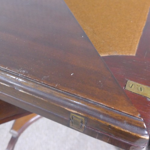 274 - An Edwardian mahogany envelope card table, having single frieze drawer, raised platform undertier, W... 