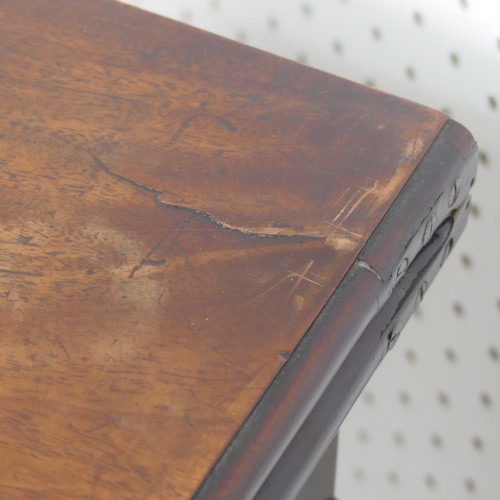 275 - A Victorian mahogany serpentine fold over Card Table, on square tapering legs, signs of woodworm on ... 