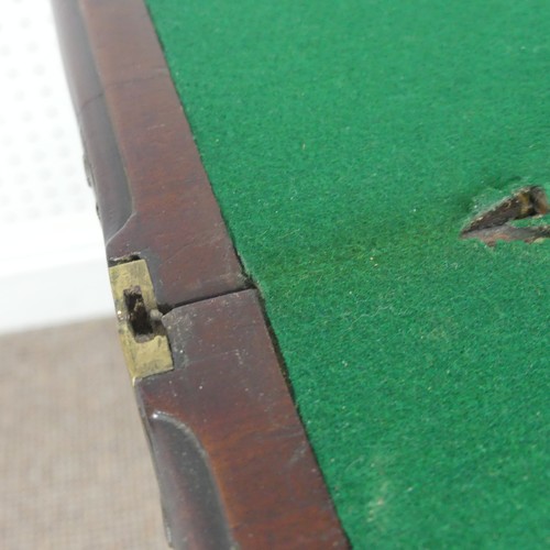 275 - A Victorian mahogany serpentine fold over Card Table, on square tapering legs, signs of woodworm on ... 