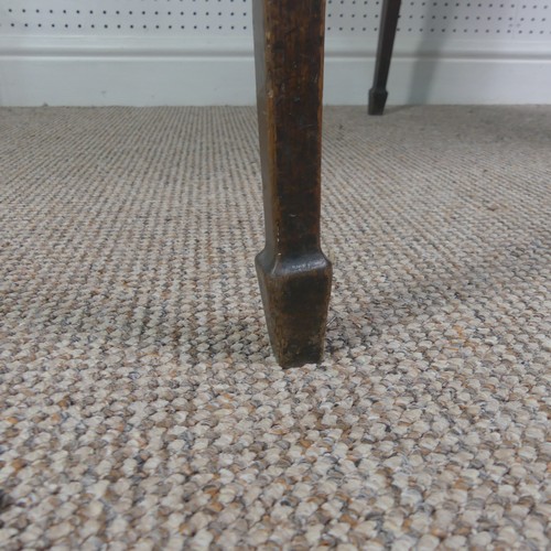 275 - A Victorian mahogany serpentine fold over Card Table, on square tapering legs, signs of woodworm on ... 