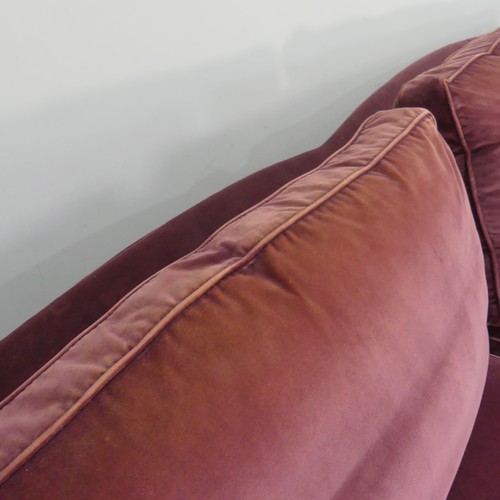 279 - A good quality Howard style, club two seater sofa, upholstered in purple with some fading near the t... 