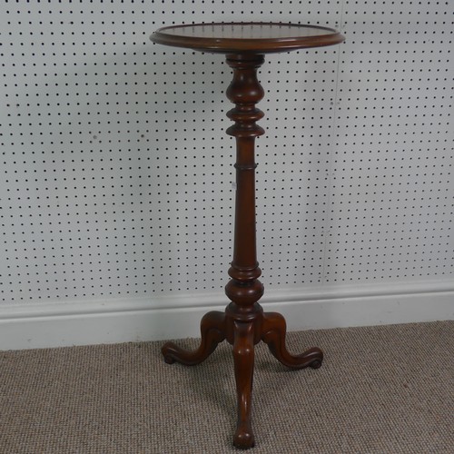 280 - A late Victorian mahogany plant stand/tall wine table, circular top upon turned column supported by ... 