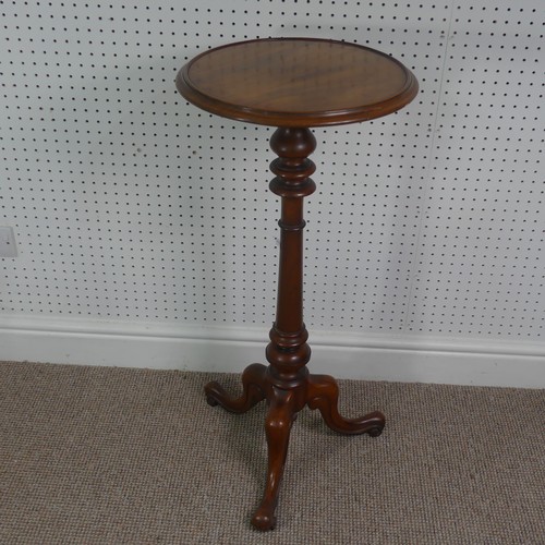 280 - A late Victorian mahogany plant stand/tall wine table, circular top upon turned column supported by ... 