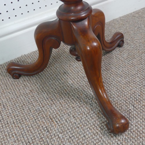 280 - A late Victorian mahogany plant stand/tall wine table, circular top upon turned column supported by ... 