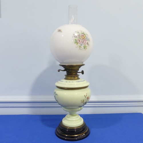 282 - A 19th century Hinks & Sons Patent, brass and milk glass oil lamp with green painted body, W 20 ... 