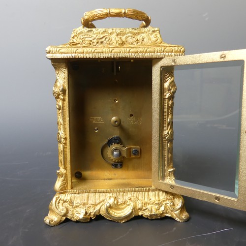 221 - A 20th century English Fema gilt brass Carriage Clock, the white rectangular dial with Roman numeral... 