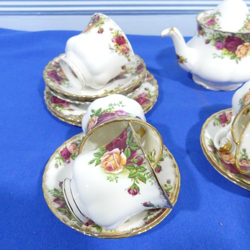 52 - A Royal Albert 'Old Country Roses' pattern Tea Set, comprising Teapot, six Teacups and Saucers, two ... 