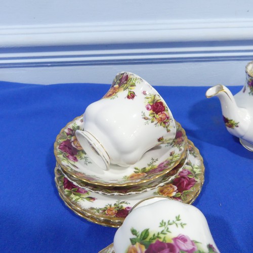 52 - A Royal Albert 'Old Country Roses' pattern Tea Set, comprising Teapot, six Teacups and Saucers, two ... 