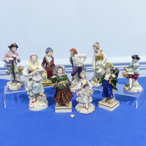 63 - A small quantity of Sitzendorf porcelain Figures, to comprise a worker with spade, a pair of two you... 