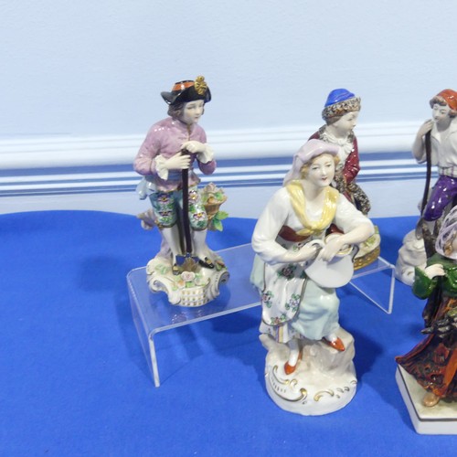 63 - A small quantity of Sitzendorf porcelain Figures, to comprise a worker with spade, a pair of two you... 