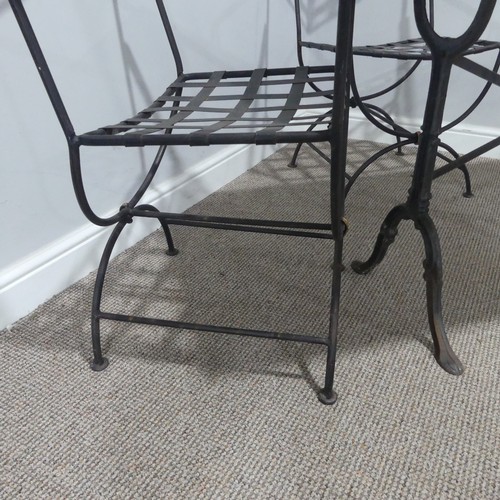 402 - A Garden Suite including a set of three metal Garden Chairs with a black paint finish together with ... 