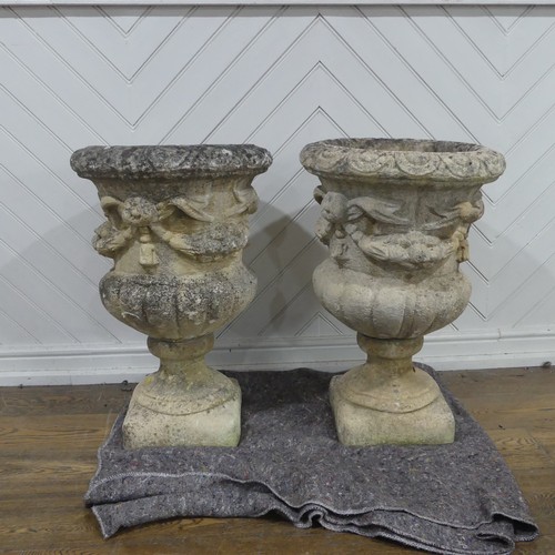 403 - A pair of Reconstituted stone classical Garden Urns with swag decoration raised on base, W 50 cm x H... 