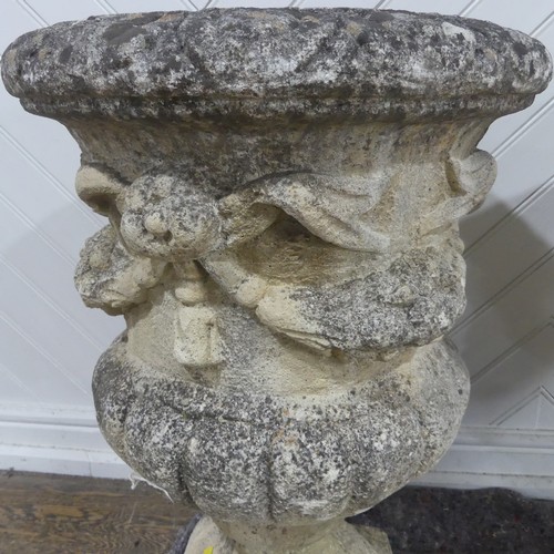 403 - A pair of Reconstituted stone classical Garden Urns with swag decoration raised on base, W 50 cm x H... 