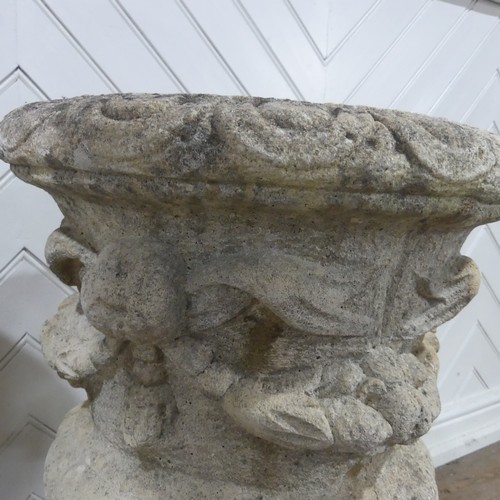 403 - A pair of Reconstituted stone classical Garden Urns with swag decoration raised on base, W 50 cm x H... 