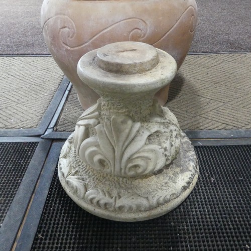 404 - A late 20th Century composite stone half fluted terrace vase or urn, on moulded plinth base and stan... 