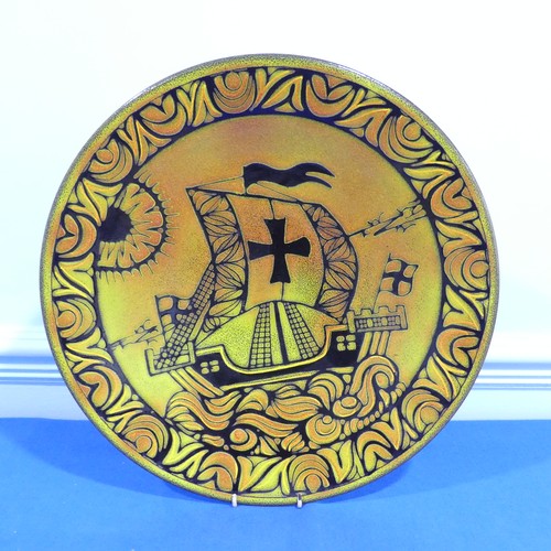 67 - A Poole pottery aegean Charger, in Danish decorated with a viking ship, Diameter 41 cm x Height 6 cm... 