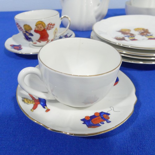 71 - A Bavarian porcelain child's Tea Set, to comprise four Tea Cups and Saucers, Teapot, etc. 15 pieces ... 