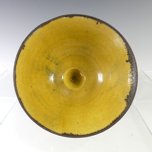 6 - Emmanuel Cooper (British; 1938-2012) a studio pottery Footed Bowl, of yellow ground with manganese r... 