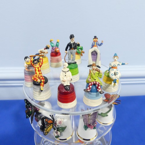 200 - Thimble Collection Club : twelve boxed thimbles and a perspex dome display case, togeter with two St... 