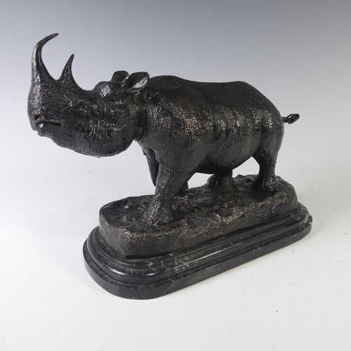 211 - After Julie Moigniez (American, 20th century), a cast patinated bronze sculpture of a Rhinoceros, si... 