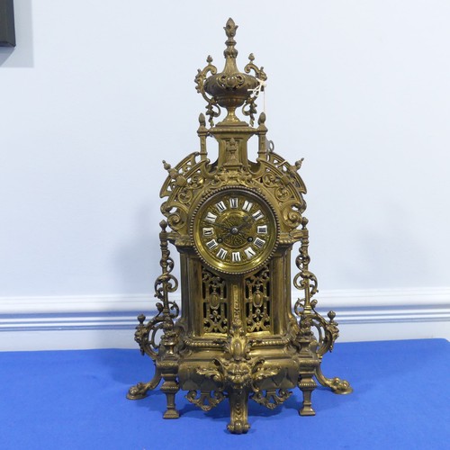 230 - A French gilt brass Gothic revival style Mantel Clock, late 19th century, the pierced architectural ... 