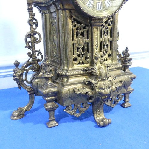 230 - A French gilt brass Gothic revival style Mantel Clock, late 19th century, the pierced architectural ... 