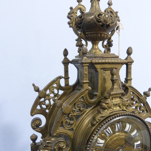 230 - A French gilt brass Gothic revival style Mantel Clock, late 19th century, the pierced architectural ... 