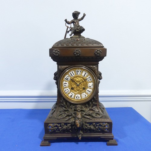 231 - A French bronzed-metal Mantel Clock, late 19th century, the architectural case surmounted with an ch... 