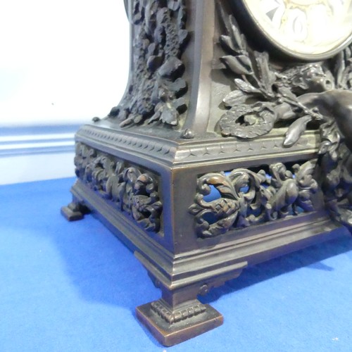 231 - A French bronzed-metal Mantel Clock, late 19th century, the architectural case surmounted with an ch... 