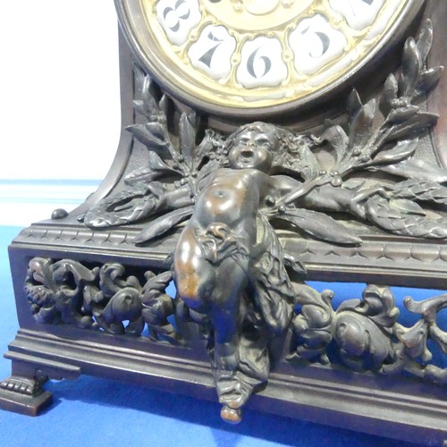 231 - A French bronzed-metal Mantel Clock, late 19th century, the architectural case surmounted with an ch... 