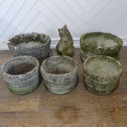 406 - A lot of five weathered reconstituted stone planters, shaped and carved to look like wooden barrels,... 