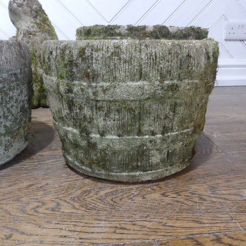 406 - A lot of five weathered reconstituted stone planters, shaped and carved to look like wooden barrels,... 