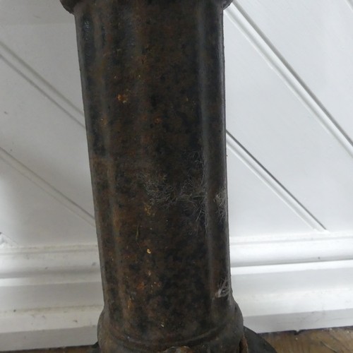 408 - An Antique hand operated cast iron water pump, W 36 cm x H 67 cm x D 16 cm.