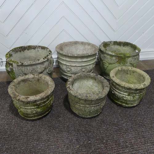 409 - A pair of weathered reconstituted stone Planters decorated with grape vines, together with another l... 