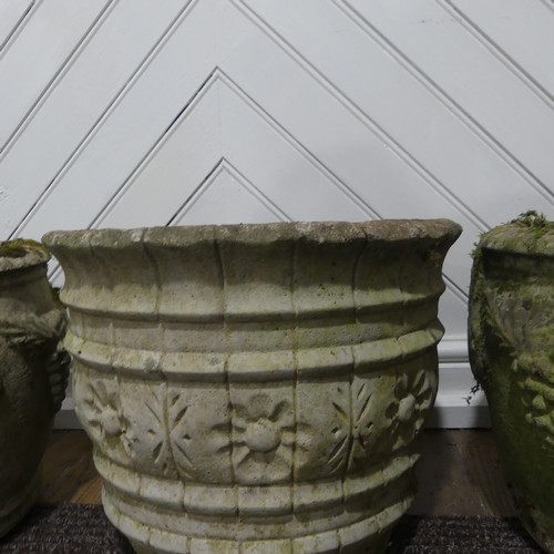 409 - A pair of weathered reconstituted stone Planters decorated with grape vines, together with another l... 