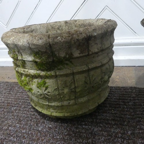 409 - A pair of weathered reconstituted stone Planters decorated with grape vines, together with another l... 