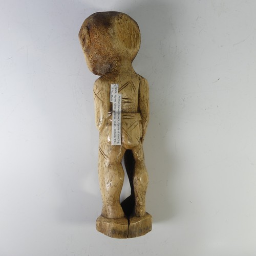 213 - An Inuit Carved Bone Sculpture of standing figure, signed Karoo Ashevak (1940 – October 19, 1974), s... 