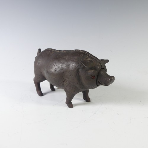 A cast iron Butcher’s Shop counter Bell in the form of a fat Pig, the bell operated by either pressing the nose or tail, 16cm long.