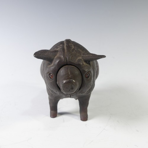 379 - A cast iron Butcher’s Shop counter Bell in the form of a fat Pig, the bell operated by either pressi... 