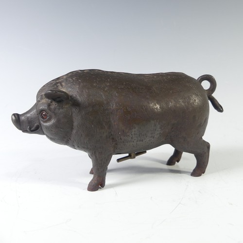 379 - A cast iron Butcher’s Shop counter Bell in the form of a fat Pig, the bell operated by either pressi... 