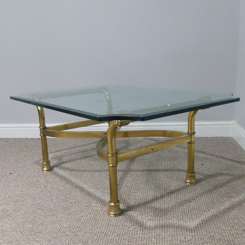 380 - A retro designer Coffee Table, (made in Italy) with shaped bevelled glass top supported by four curv... 