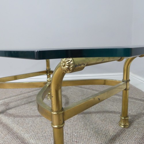 380 - A retro designer Coffee Table, (made in Italy) with shaped bevelled glass top supported by four curv... 