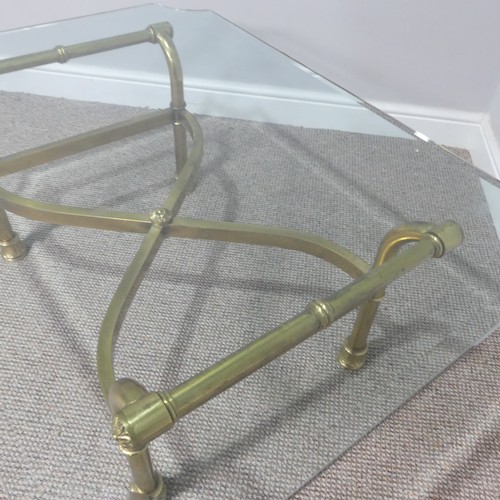 380 - A retro designer Coffee Table, (made in Italy) with shaped bevelled glass top supported by four curv... 