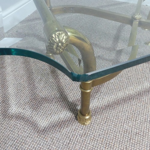 380 - A retro designer Coffee Table, (made in Italy) with shaped bevelled glass top supported by four curv... 