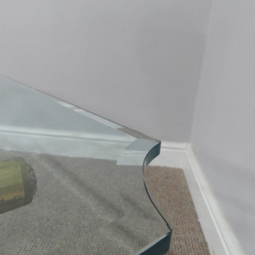 380 - A retro designer Coffee Table, (made in Italy) with shaped bevelled glass top supported by four curv... 