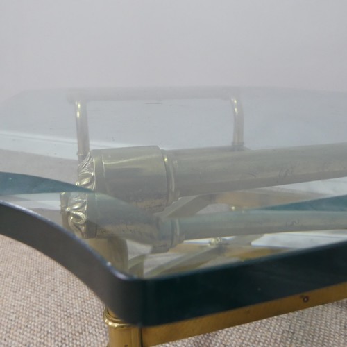 380 - A retro designer Coffee Table, (made in Italy) with shaped bevelled glass top supported by four curv... 