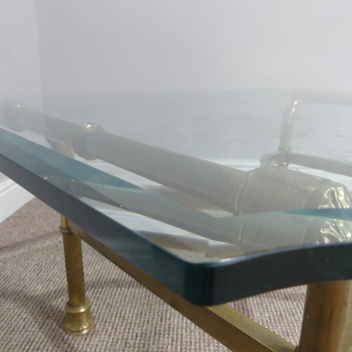 380 - A retro designer Coffee Table, (made in Italy) with shaped bevelled glass top supported by four curv... 